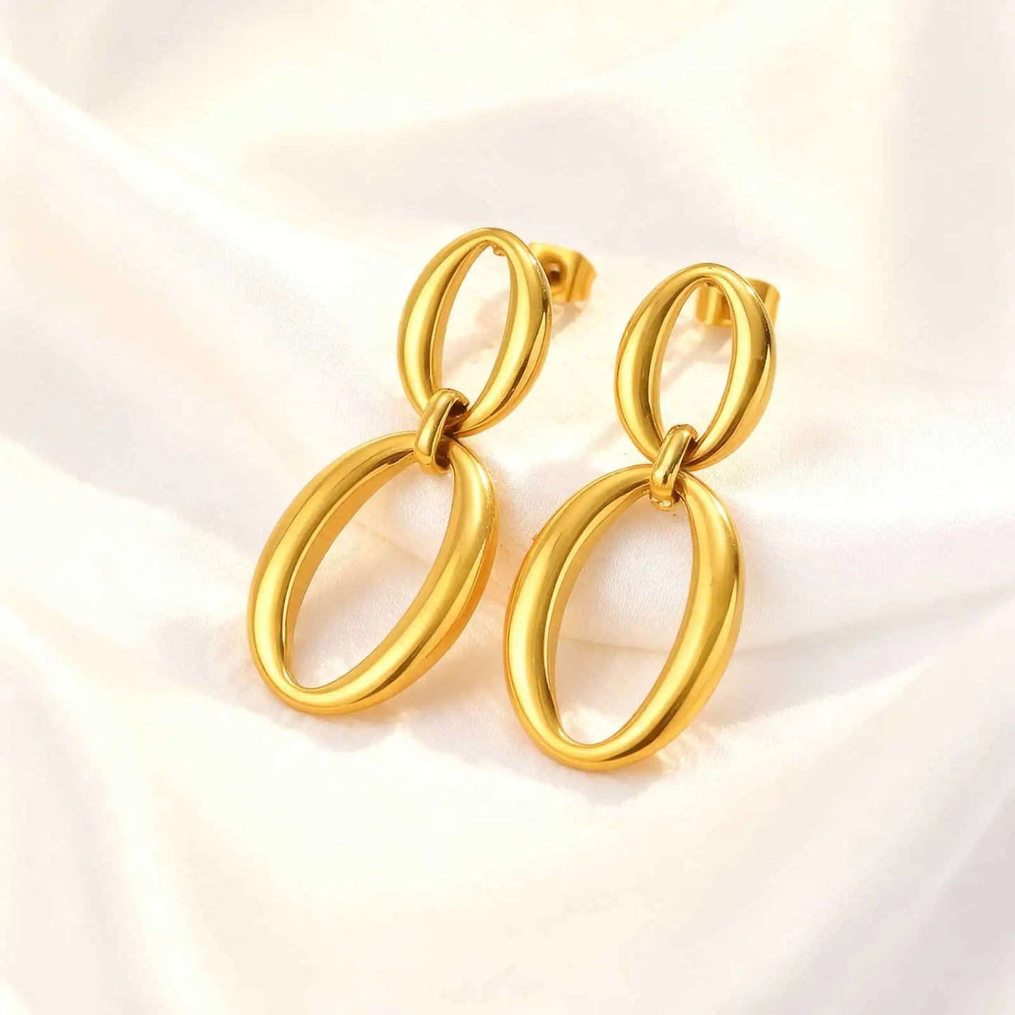 Ellivra Curve – Minimalist Elliptical Stud Earrings