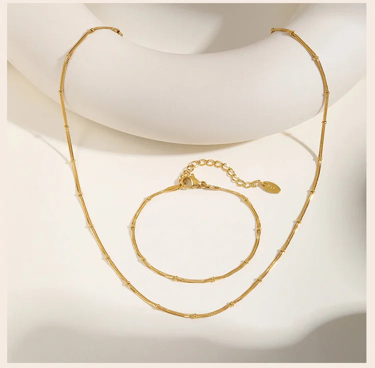 Serpella Glow – Gold-Plated Snake Bead Bracelet