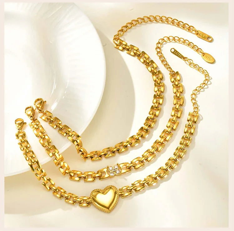 Florence Gleam – Mesh Chain Four-Leaf Flower Bracelet