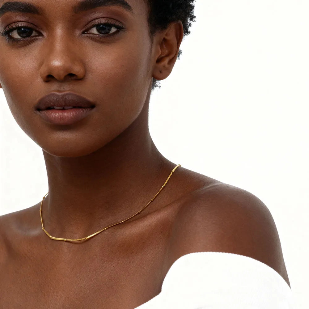 Serpella Glow – Gold-Plated Snake Bead Bracelet